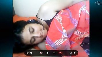 Man pressing her wife's boobs and finguring in her pussy